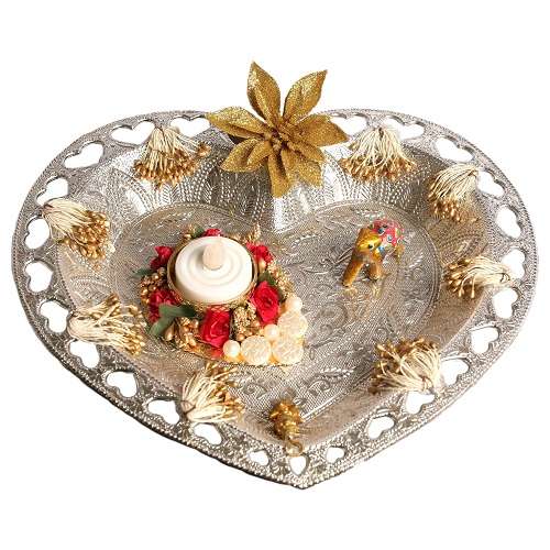 Harathi plate heart shape silver colour.