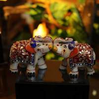 Wedding return gift elephant pair.