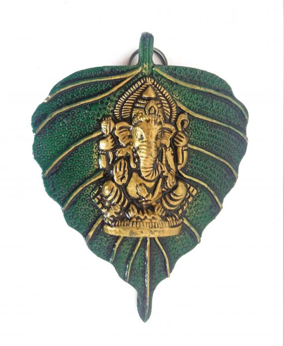 Ganesh idol on leaf.