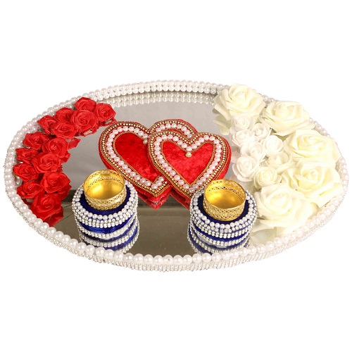 Aarthi plate acrylic for wedding with pearl.