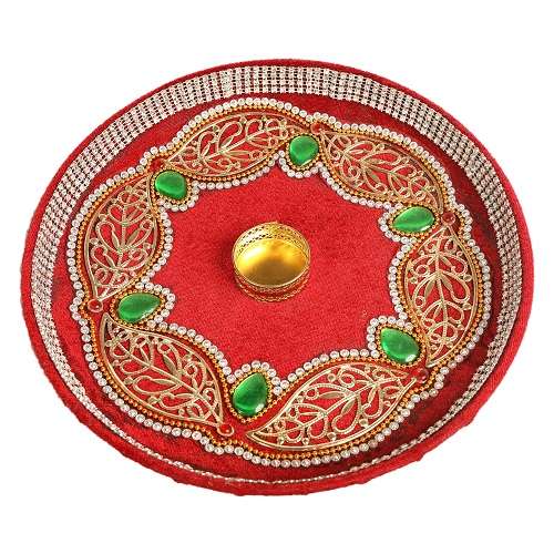 Arathi plate decorated red with stones.
